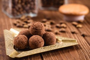 Truffle chocolate candies with cocoa powder