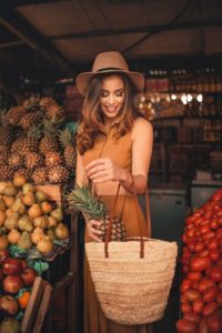 Stylish woman shopping for fruit