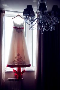 dress hanging in window
